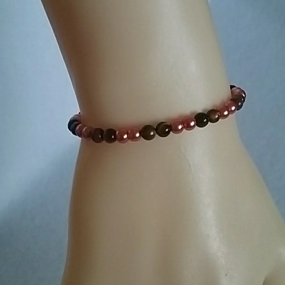 Girls coral and brown beaded bracelet